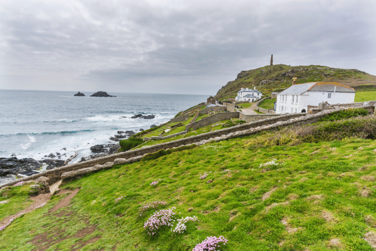 An image of the sea off Cape Cornwall on a grey, gloomy day. It is a great place to stormwatch in Cornwall